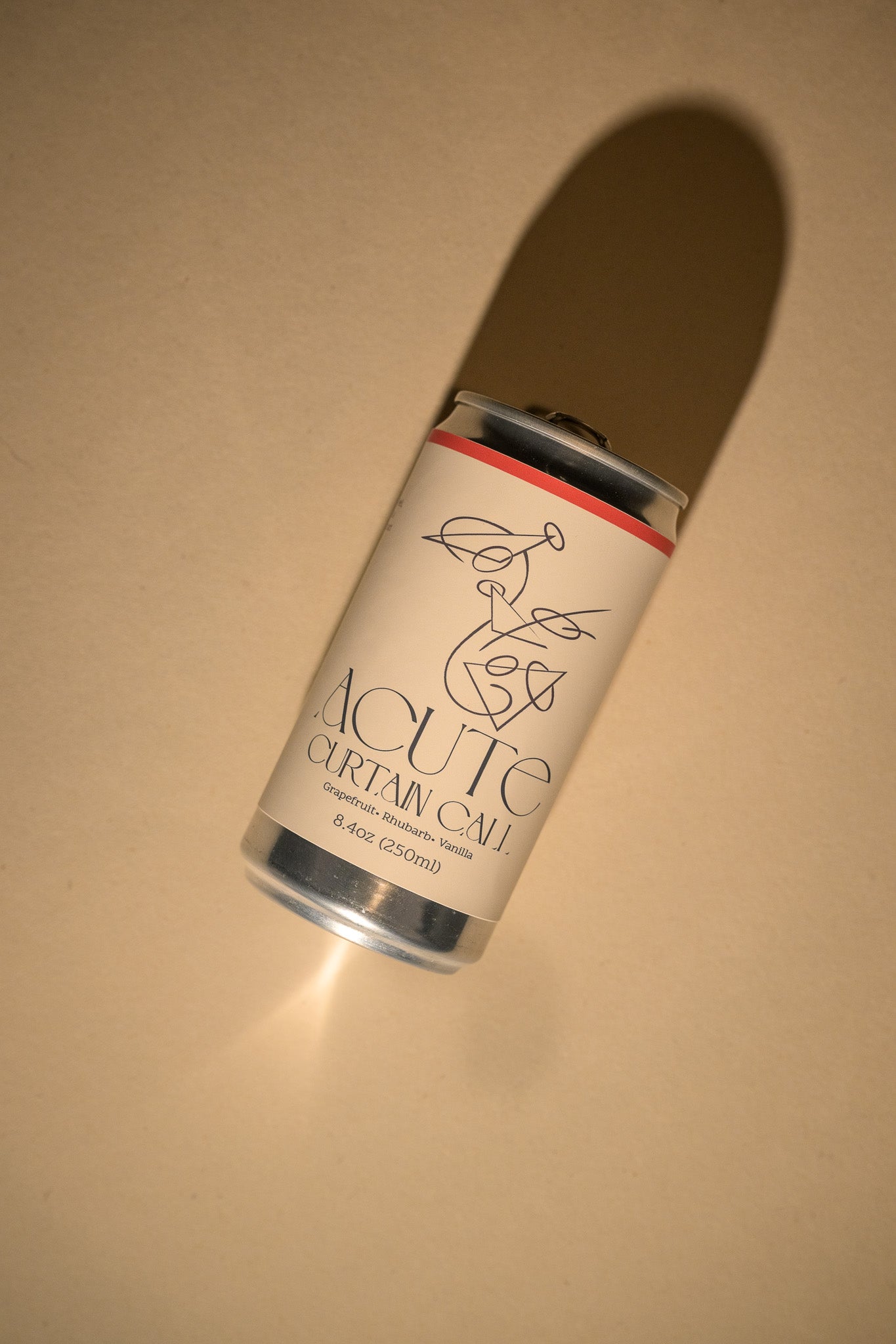 Can of Acute Curtain Care on a beige background