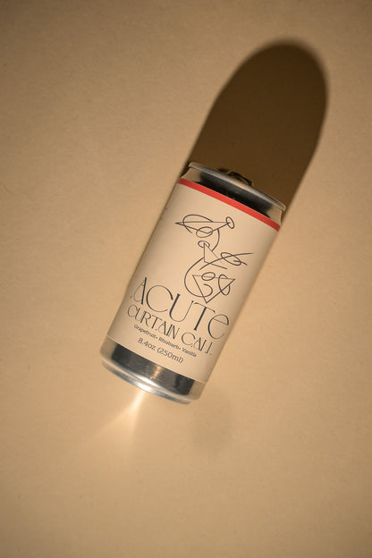 Can of Acute Curtain Care on a beige background