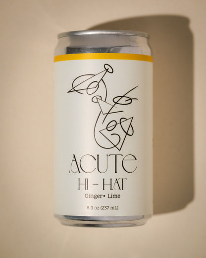 Can of Acute Hi-Hat ginger lime drink on a beige background