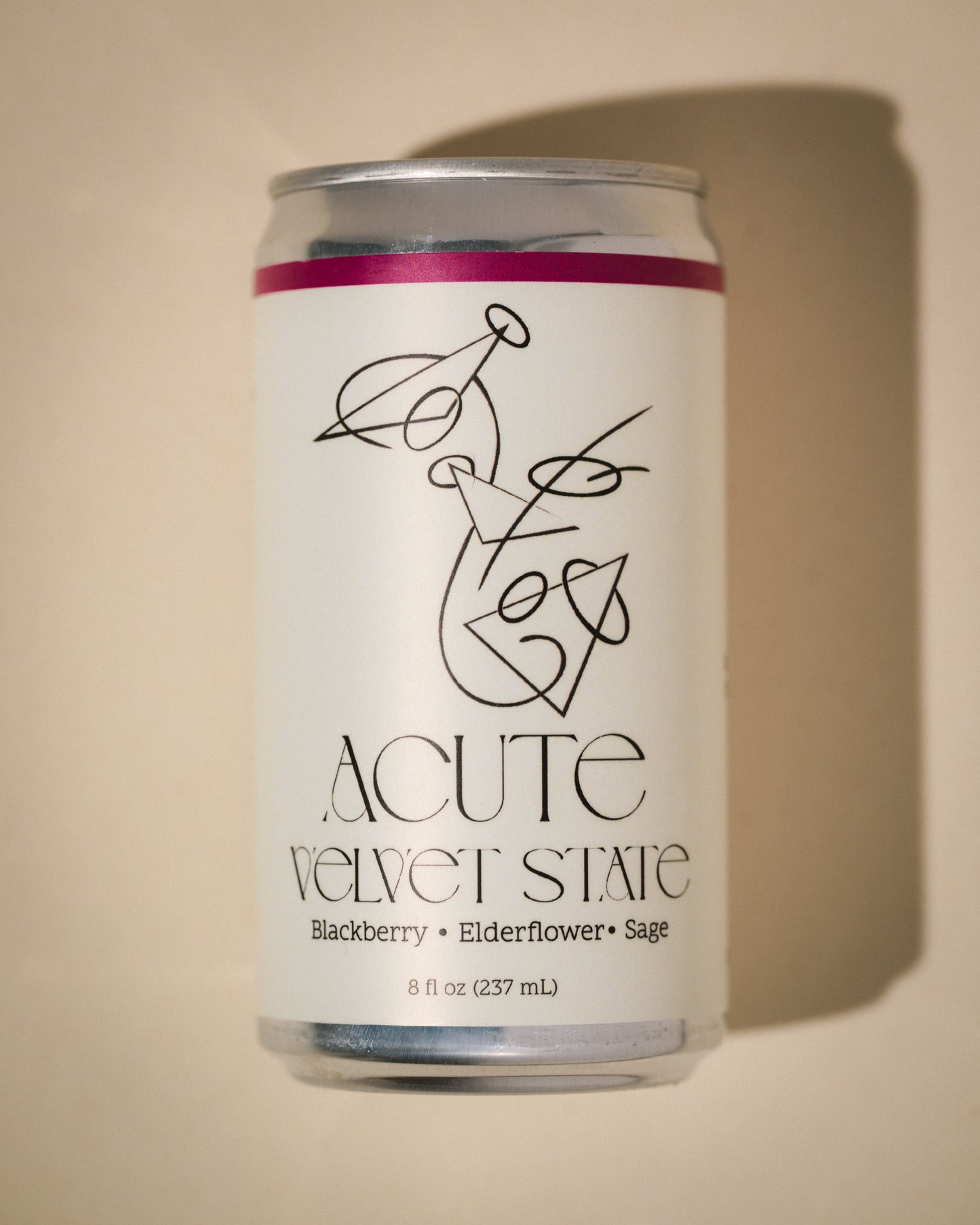 Can of Acute Velvet State drink on a beige background